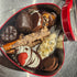 Assorted Chocolate Covered Treats in a Heart-Shaped Tin
